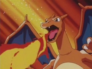 Charizard de Ash usando lanzallamas.