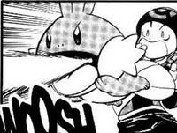 Mumu usando pistola agua.