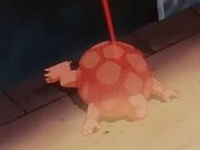 Golem vencido regresa a su Pokébola/Poké Ball.