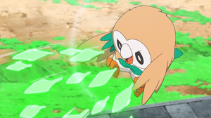 Rowlet de Ash usando follaje.