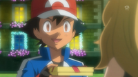 Ash entregando un regalo a Serena.