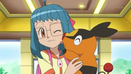 Nanette eligiendo a Tepig como su Pokémon inicial.