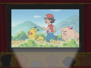 Isamu Akai aparece en los recuerdos de Ash, con su Pikachu y su Clefairy.