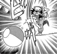 Isamu Akai lanzando una Poké Ball.