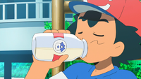 Ash bebiendo leche Mu-mu.