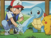EP033 Squirtle usando pistola agua.png