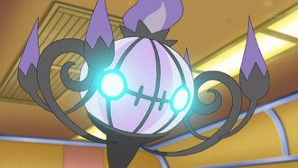 Chandelure usando psíquico: sus ojos se iluminan...
