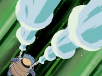 Blastoise usando hidrobomba.