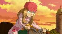 Serena usando su uniforme para montar a los Pokémon.