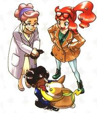 Sonia junto con la profesora Magnolia, un Yamper y Luis.
