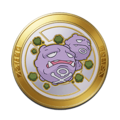 Medalla Weezing Oro UNITE.png