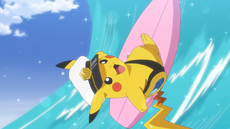 Capitán Pikachu surfeando.