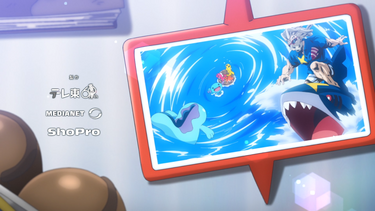 Foto del Súper G, Quagsire y Sharpedo rescatando a los Tatsugiri y Wooper mostrada en el EP1314.
