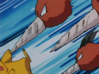 Dodrio usando pico taladro contra el Pikachu de Ash.