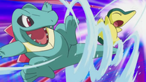 Totodile de Khoury usando cola acua/acua cola.