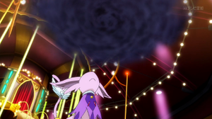 Espeon de Amelia usando danza lluvia.