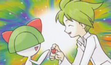 Blasco junto a Ralts en el Juego de Cartas Coleccionables Pokémon.