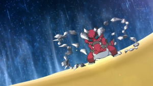 Krokorok usando roca afilada.