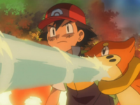 Buizel de Ash usando pistola agua.