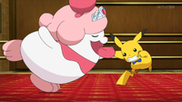 Slurpuff de Miette y Pikachu de Ash bailando.