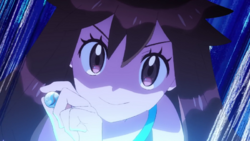 Green/Verde mostrando su Blastoisita.