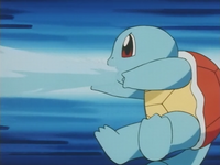 Squirtle de Ash usando pistola agua.