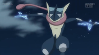 Greninja de Ash usando shuriken de agua.