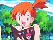 EP159 Misty leyendo el libro de la fortuna Pokémon.png
