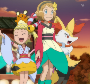 Serena y Bonnie/Clem (anime) con trajes de Chingling y Florges.