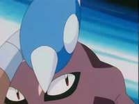 Hitmontop usando triple patada.