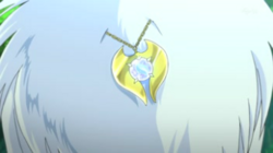 La Absolita en el collar del Absol de Ástrid.