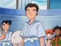 Árbitro Pokémon/Juez Pokémon del Gimnasio Pokémon de Ciudad Violeta/Gimnasio Pokémon de Ciudad Malva.