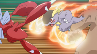 Mega-Kangaskhan de Ilima/Liam usando puño incremento.