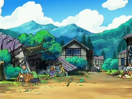 Ash, Dawn/Maya y Brock encuentran la aldea destruida al día siguiente.