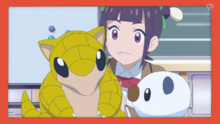 Ann junto con su Oshawott y Sandshrew.