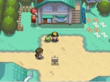 Plata espiando en la ventana del laboratorio del profesor Elm en Pokémon Oro HeartGold y Pokémon Plata SoulSilver.