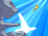 Steelix usando cola férrea contra el Pikachu de Ash.