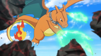 Charizard de Alain usando garra dragón.