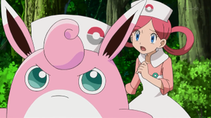 Wigglytuff con la enfermera Joy.