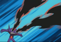 Un Sableye usando Tinieblas.