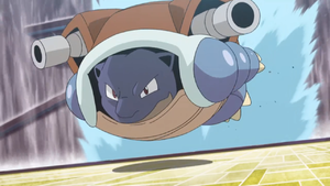 Blastoise del marinero usando cabezazo.