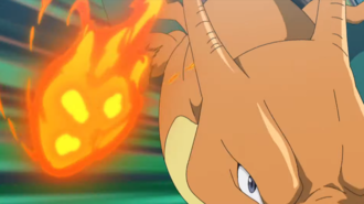 Charizard de Kiawe usando puño fuego.