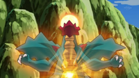 Druddigon de Emmy usando meteoro dragón/cometa draco.