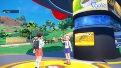 Encuentro con los demás jugadores en un centro Pokémon frente al monitor del círculo.