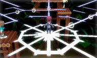 Kalm sobre una telaraña en el gimnasio de Ciudad Novarte, cuya líder es Violeta y utiliza Pokémon de tipo bicho.