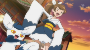 Desfile con traje de Meowstic hembra.