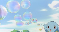 Squirtle de Ash usando burbuja en la P01.